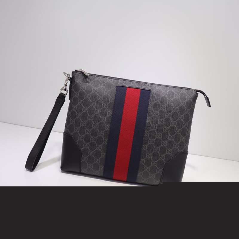G*u*i clutch bags